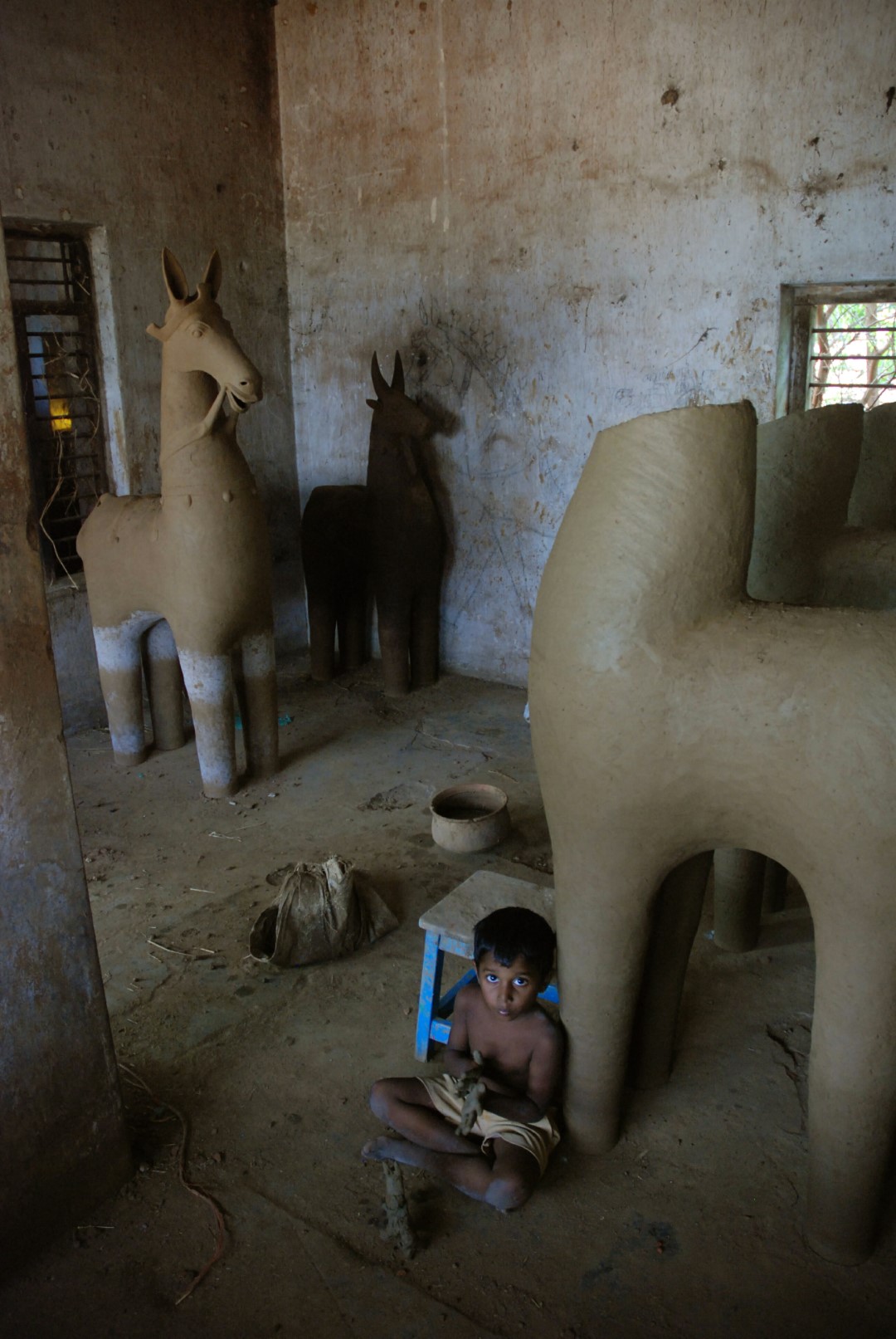 <span style="font-weight:normal;">In 2007, Subash, at four years old, was already an accomplished sculptor. Today, Subash barely touches clay any longer.</span>