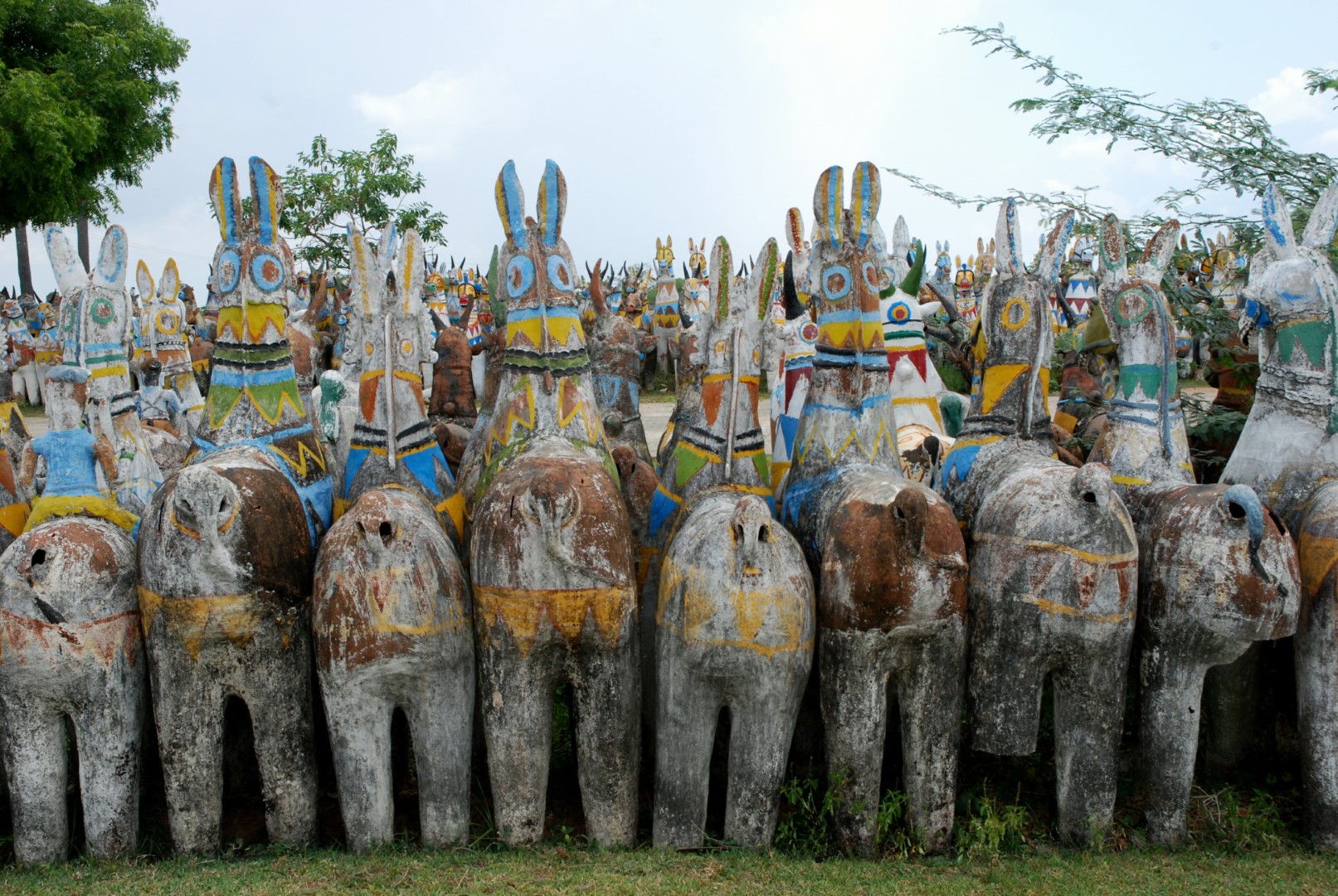 <span style="font-weight:normal;">Horses and bulls stand tightly together in neat lines in this shrine. Most are in excellent condition, although years under the sun have begun to wear away the paint, and some have seen their legs destroyed, in all likeliness due to combined factors of inherent structural weakness and grazing goats.</span>