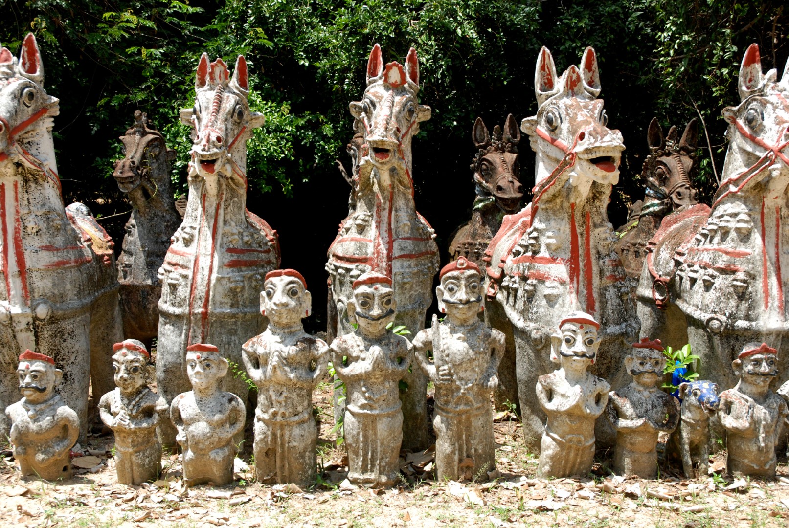 <span style="font-weight:normal;">This shrine is located about ten kilometres from the sea (the Bay of Bangal). The older statues are coated with a fine layer of sand.</span>